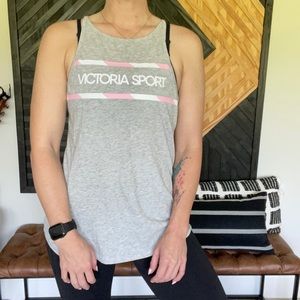 Grey, with pink and white letters. (Victoria Sport) with exposed back. Size sm